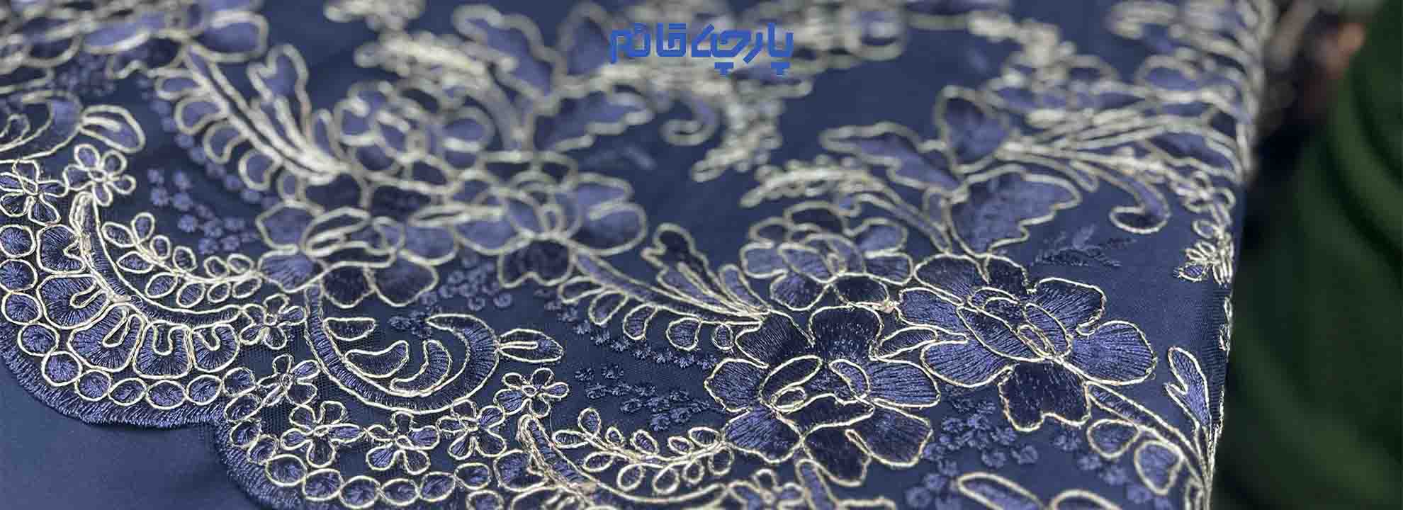 پارچه مجلسی سرمه ای گل دار