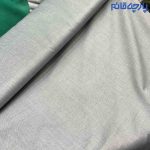 پارچه مردانه پیراهنی مردانه ساده تترون تایلندی بافت جناقی رنگ طوسی روشن.