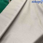 پارچه مردانه پیراهنی مردانه ساده تترون تایلندی بافت خاویاری رنگ کرم قهوه ای .