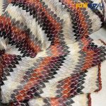 پارچه بهاره و تابستانه میسونی بهاره طرح مثلثی رنگ نارنجی آجری