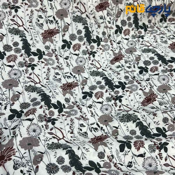 پارچه بهاره و تابستانه وال طرحدار کره خاص زمینه سفید گل ریز خطی