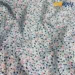 پارچه بهاره و تابستانه وال طرحدار کره ریز گل رنگ سرمه ای صورتی.