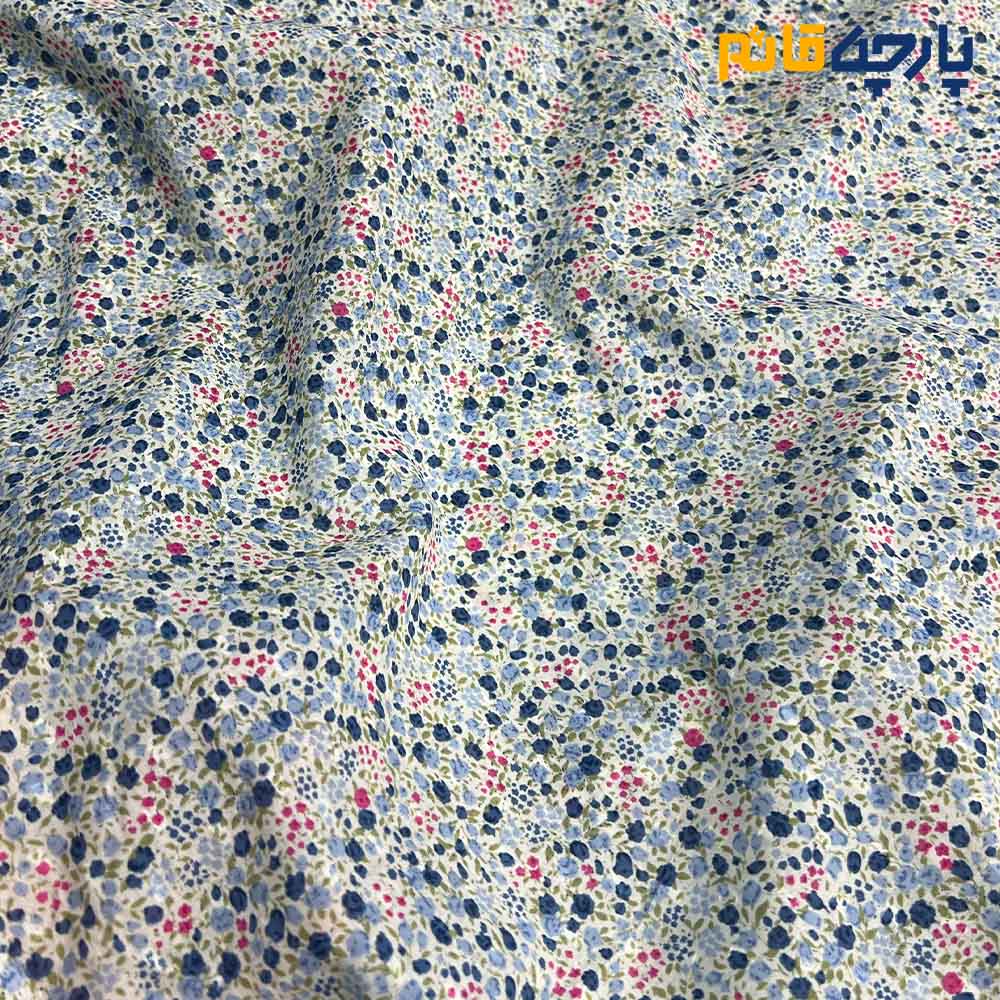 پارچه بهاره و تابستانه وال طرحدار کره ریز گل رنگ سرمه ای صورتی.