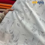 پارچه بهاره و تابستانه وال طرحدار کره زمینه آبی طوسی روشن گل طوسی ذغالی.