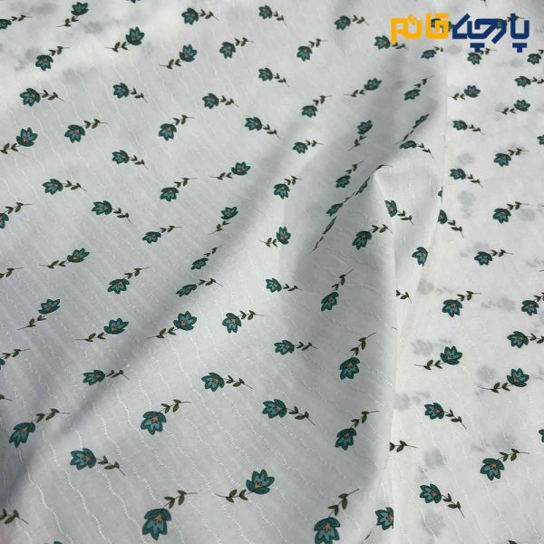 پارچه بهاره و تابستانه وال طرحدار کره زمینه سفید گل سبز ریز