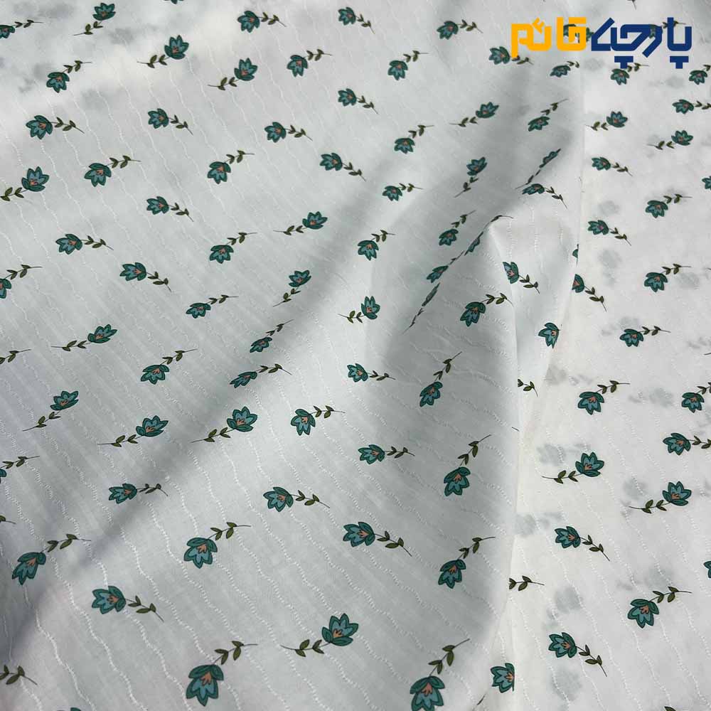پارچه بهاره و تابستانه وال طرحدار کره زمینه سفید گل سبز ریز