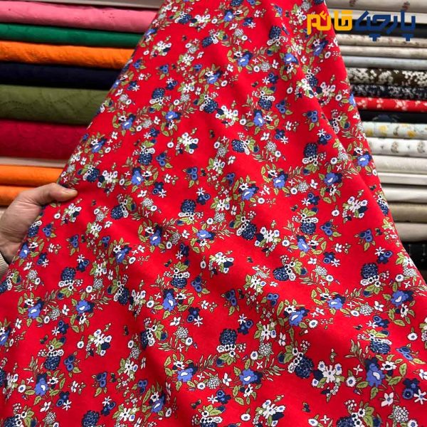 پارچه بهاره و تابستانه وال طرحدار کره زمینه قرمز شاد گل آبی و سفید