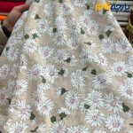 پارچه بهاره و تابستانه وال طرحدار کره زمینه کرم روشن گل سفید