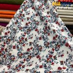 پارچه بهاره و تابستانه وال طرحدار کره سفید گل ریز قرمز .