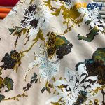 پارچه بهاره و تابستانه وال طرحدار کره طرح شاخه و‌گل زمینه کرم صورتی .