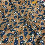 پارچه بهاره و تابستانه وال طرحدار کره نارنجی آجری روشن گل سرمه ای روشن