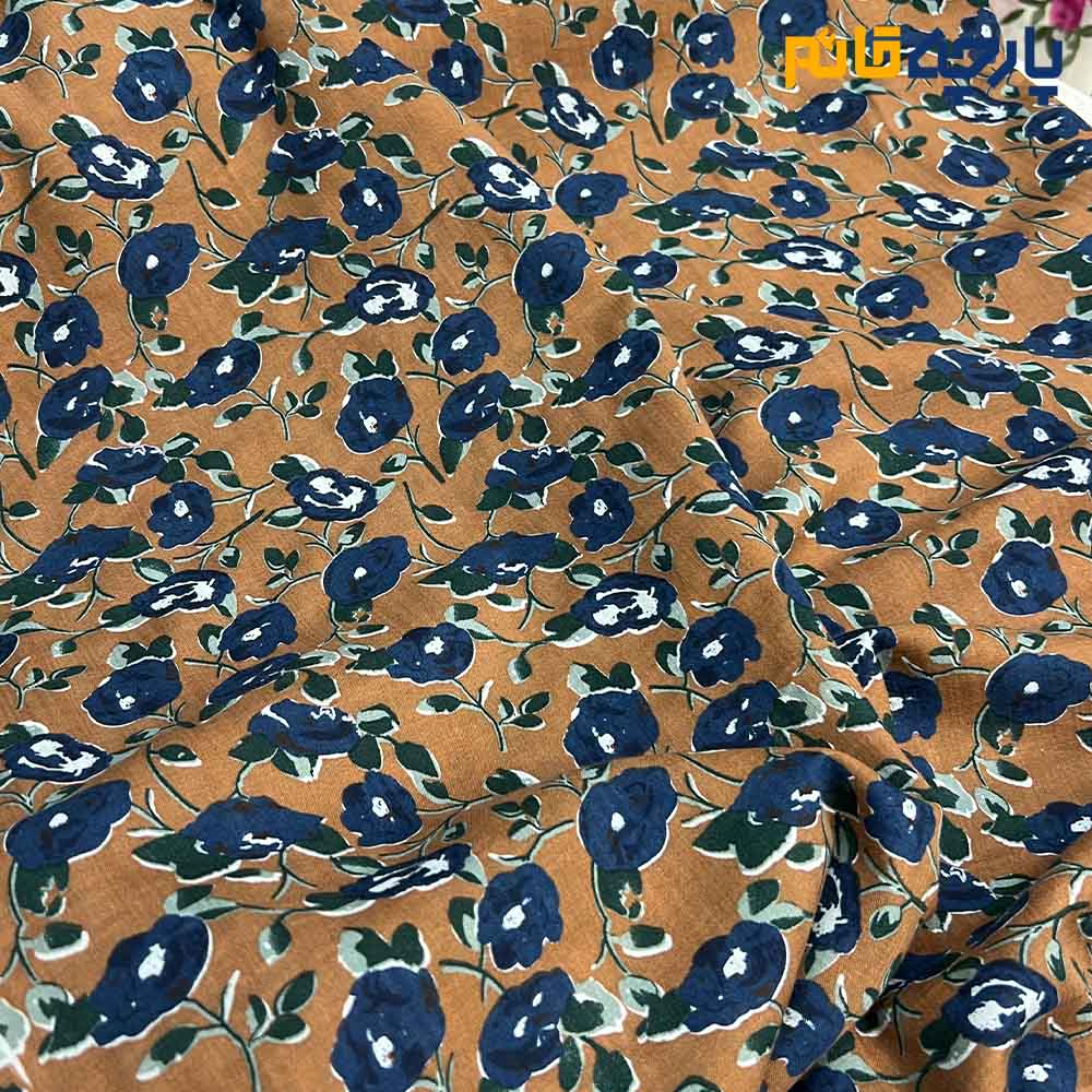پارچه بهاره و تابستانه وال طرحدار کره نارنجی آجری روشن گل سرمه ای روشن