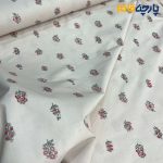 پارچه بهاره و تابستانه کتان نخ کره ای طرحدار زمینه رنگ کرم نسکافه ای گل متوسط شاخه ای