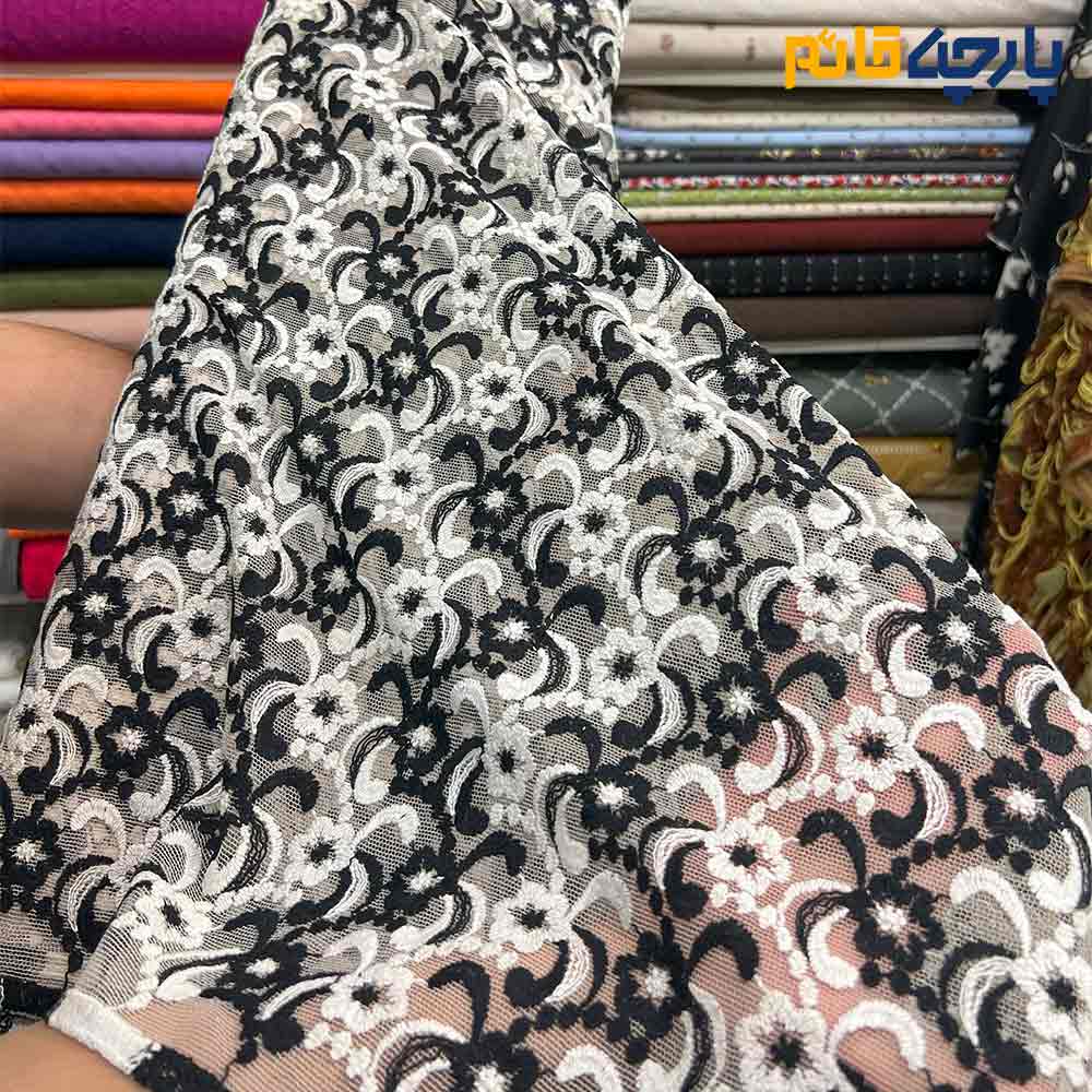 پارچه مجلسی تور کتان زمینه تور ظریف طرح برجسته رنگ مشکی و سفید