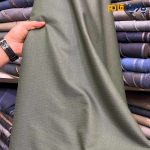 پارچه مردانه پیراهنی مردانه ساده تترون تایلندی بافت خاویاری درشت رنگ سبز زیتونی خاص