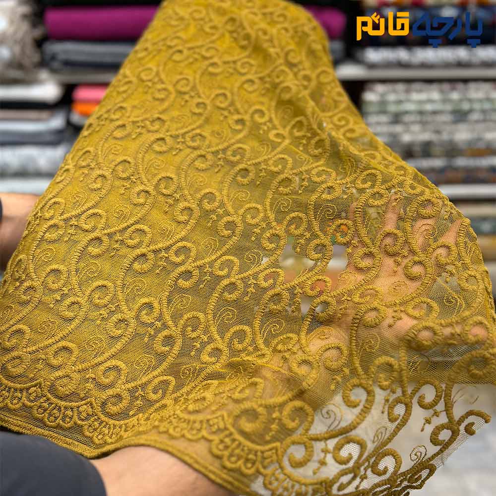 پارچه مجلسی تور کتان رنگ خردلی طرح برجسته حاشیه دار