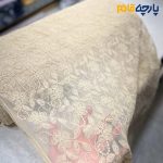 پارچه مجلسی دانتل ایتالیایی طرح گل و برگ ظریف رنگ کرم طلایی