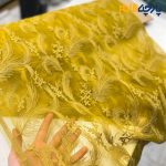 پارچه مجلسی دانتل ایتالیایی رنگ خردلی زمینه اورگاندی طرح خطی