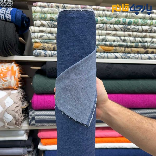 پارچه جین ظریف کش رنگ آبی سرمه ای تیره