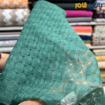 پارچه مجلسی تور کتان زمینه اورگاندی رنگ سبز خاص تیفانی طرح دایره ای منظم