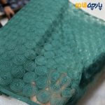 پارچه مجلسی تور کتان زمینه اورگاندی رنگ سبز خاص تیفانی طرح دایره ای منظم