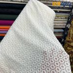 پارچه مجلسی تور کتان طرح برجسته دایره ای رنگ سفید آفوایت