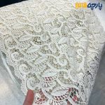 پارچه مجلسی تور کتان طرح برگ خاص حاشیه دار رنگ کرم روشن