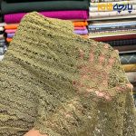 پارچه مجلسی تور کتان طرح ریز رنگ سبز زیتونی حاشیه دار