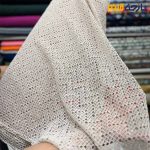 پارچه مجلسی تور کتان قلاب بافی رنگ کرم طبیعی(نچرال) طرح ریز زیگزال پولک دوزی شده