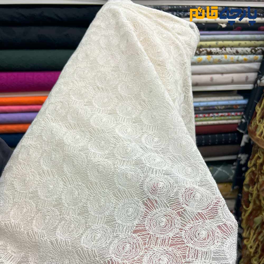 پارچه مجلسی تور کتان طرح دایره ای رنگ کرم نچرال (طبیعی) عرض۱۴۵