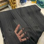 پارچه مجلسی تور کتان طرح راه راه برجسته مشکی