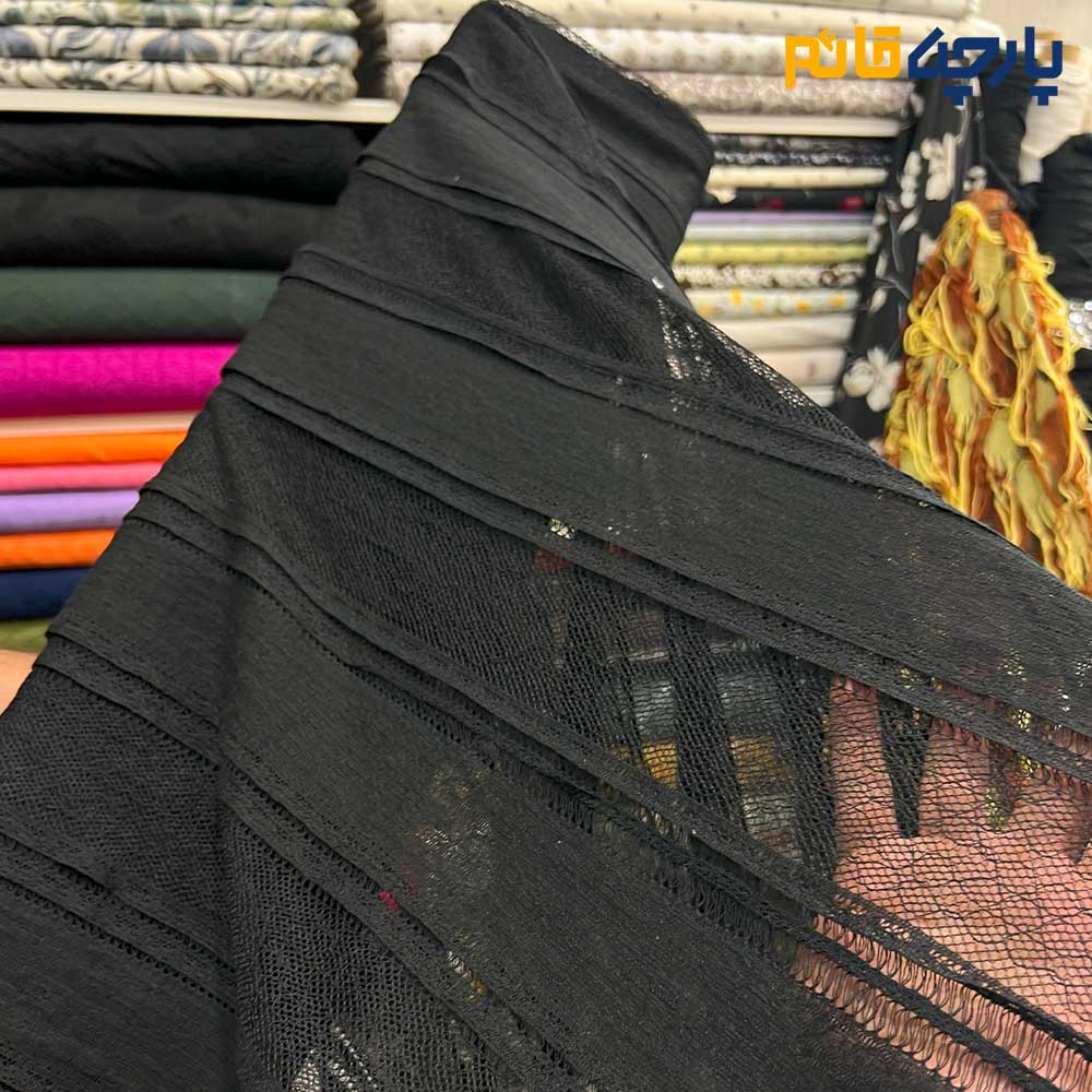 پارچه مجلسی تور کتان طرح راه راه برجسته مشکی