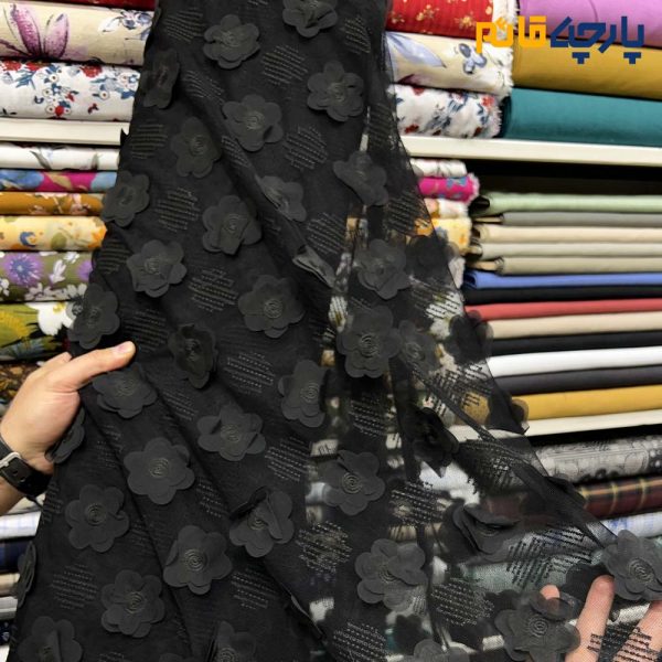 پارچه مجلسی دانتل طرح گل برجسته زمینه تور رنگ مشکی