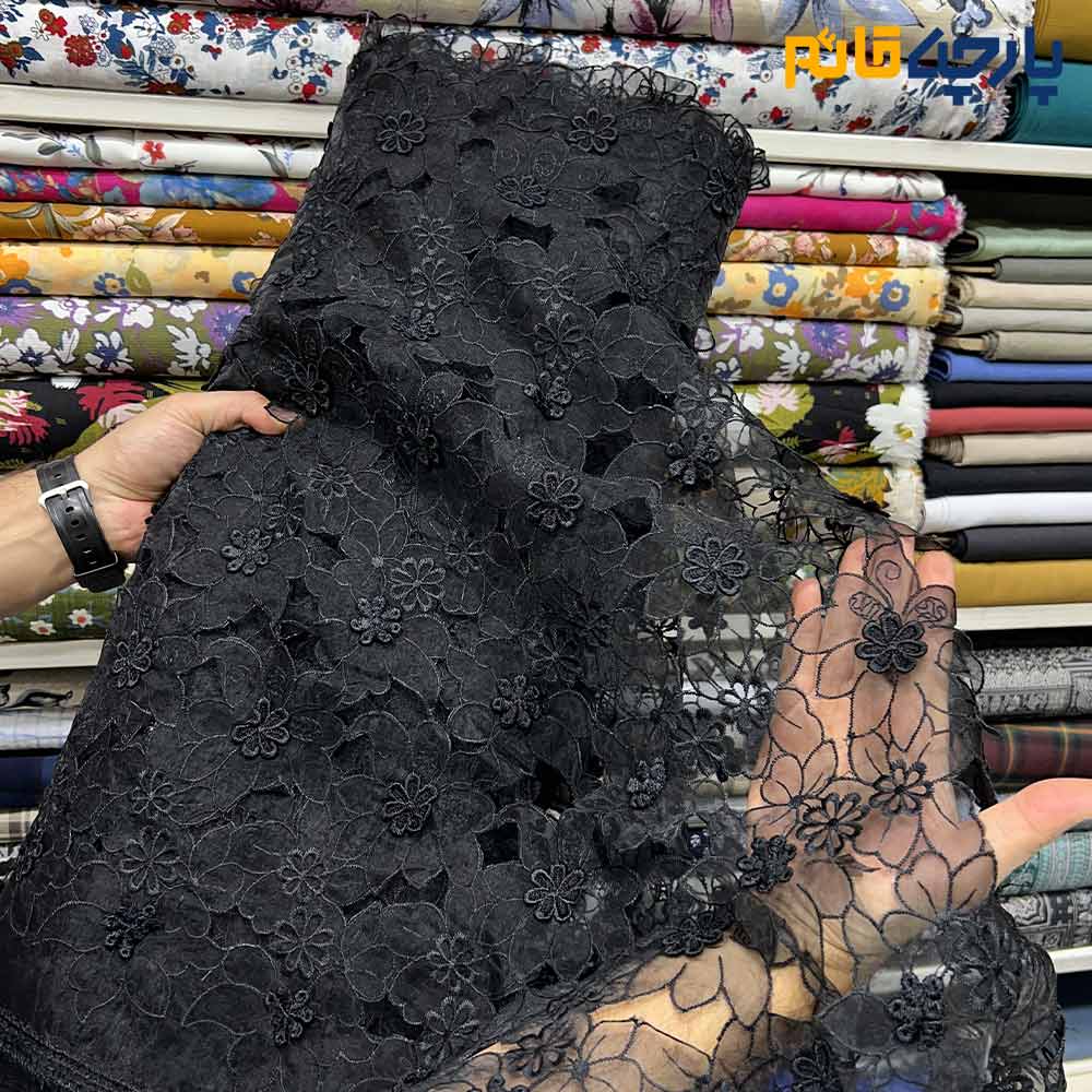 پارچه مجلسی دانتل مشکی زمینه اورگاندی گل برجسته