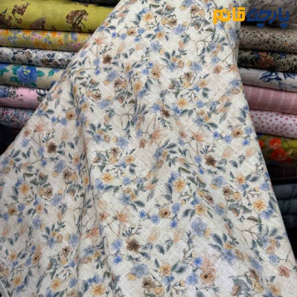 پارچه بهاره تابستانه لینن طرحدار ایتالیایی زمینه کرم شیری گل ریز