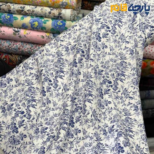 پارچه بهاره تابستانه لینن طرحدار ایتالیایی زمینه سفید گل ریز آبی کاربنی