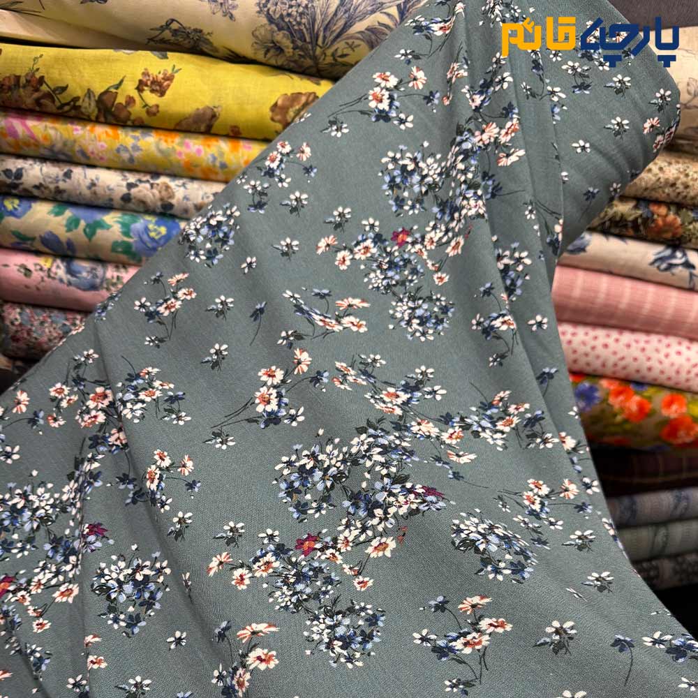 پارچه بهاره تابستانه لینن طرحدار ایتالیایی زمینه طوسی سبز روشن گل ریز