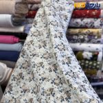 پارچه بهاره و تابستانه وال طرحدار کره ای زمینه روشن گل رز آبی نسکافه ای