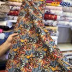پارچه بهاره و تابستانه وال طرحدار کره ای زمینه نگتیرع طرح نارنجی و آبی