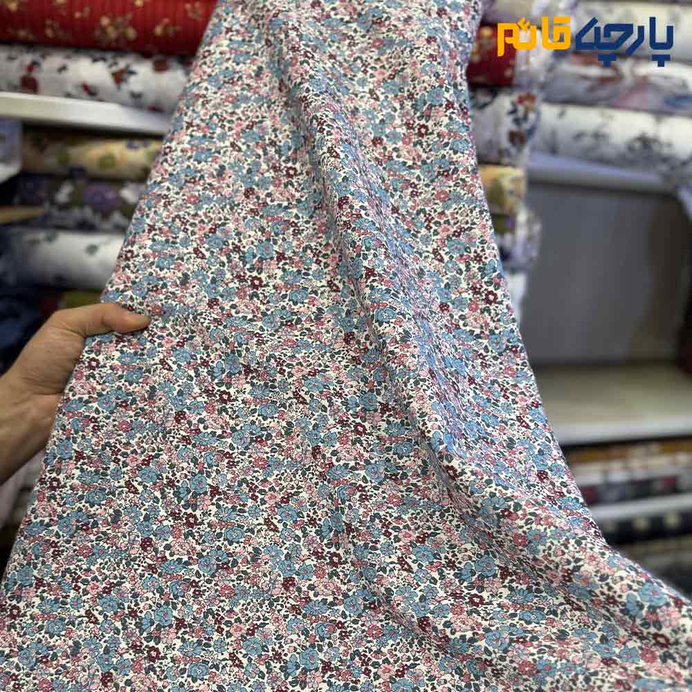 پارچه بهاره و تابستانه کتان نخ کره ای ظریف کشی طرحدار گل ریز رنگ شاد