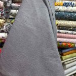 پارچه بهاره و تابستانه کتان نخ ساده ریز بافت ۲ رو رنگ کرم و طوسی روشن