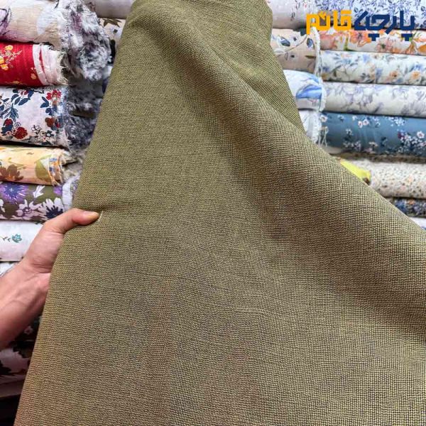 پارچه بهاره و تابستانه کتان نخ ساده ریز بافت (جوت بافت) رنگ زرد خردلی ترکیب مشکی
