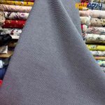 پارچه بهاره و تابستانه کتان نخ ساده ریز بافت رنگ سرمه ای سفید ۲ رو