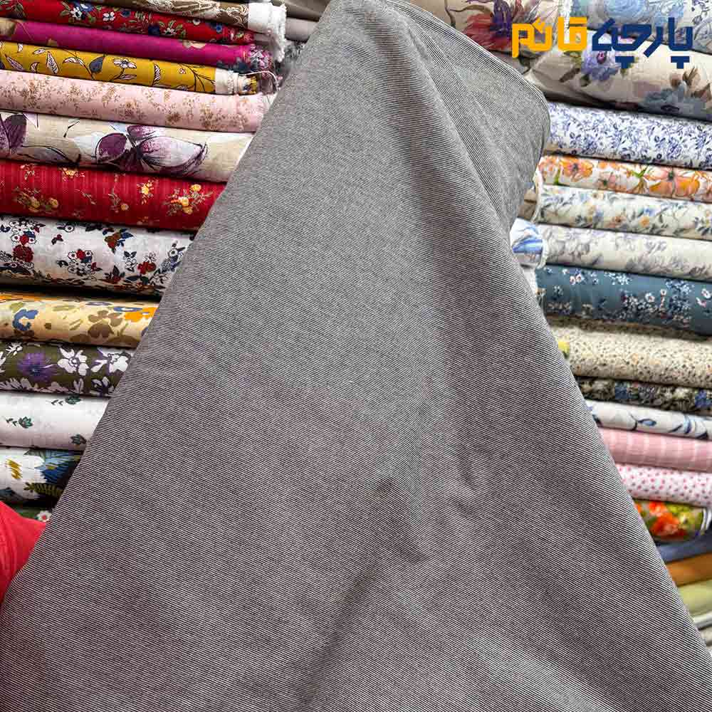 پارچه بهاره و تابستانه کتان نخ ساده ریز بافت رنگ کرم و طوسی فیلی