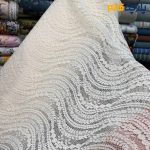 پارچه مجلسی تور کتان ایتالیایی طرح برجسته خطی شیک رنگ کرم طبیعی (نچرال)
