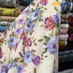پارچه بهاره تابستانه لینن طرحدار ایتالیایی زمینه کرم روشن گل رنگی شاد