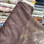 پارچه مجلسی تور کتان ایتالیایی طرح کل ریز و خط رنگ قهوه ای