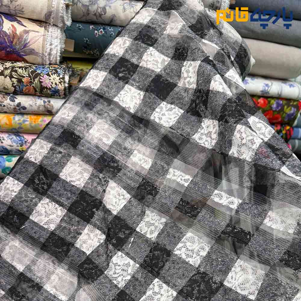 پارچه مجلسی دانتل ایتالیایی شطرنجی سفید و مشکی رباندوزی برجسته طرح گل