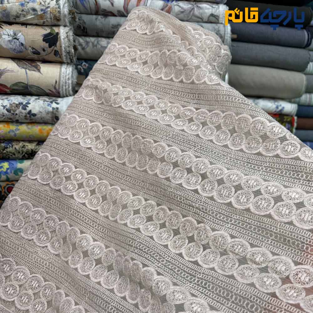 پارچه مجلسی تور کتان طرح دایره و‌خط رنگ صورتی پنککی