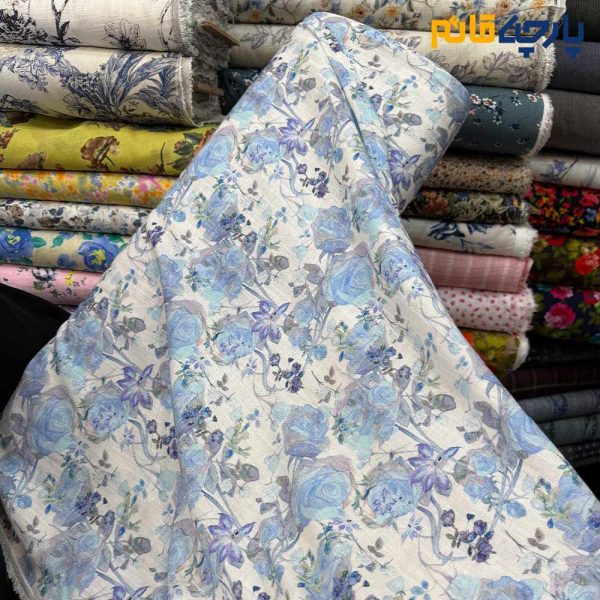 پارچه بهاره تابستانه لینن طرحدار ایتالیایی زمینه روشن گل آبی روشن